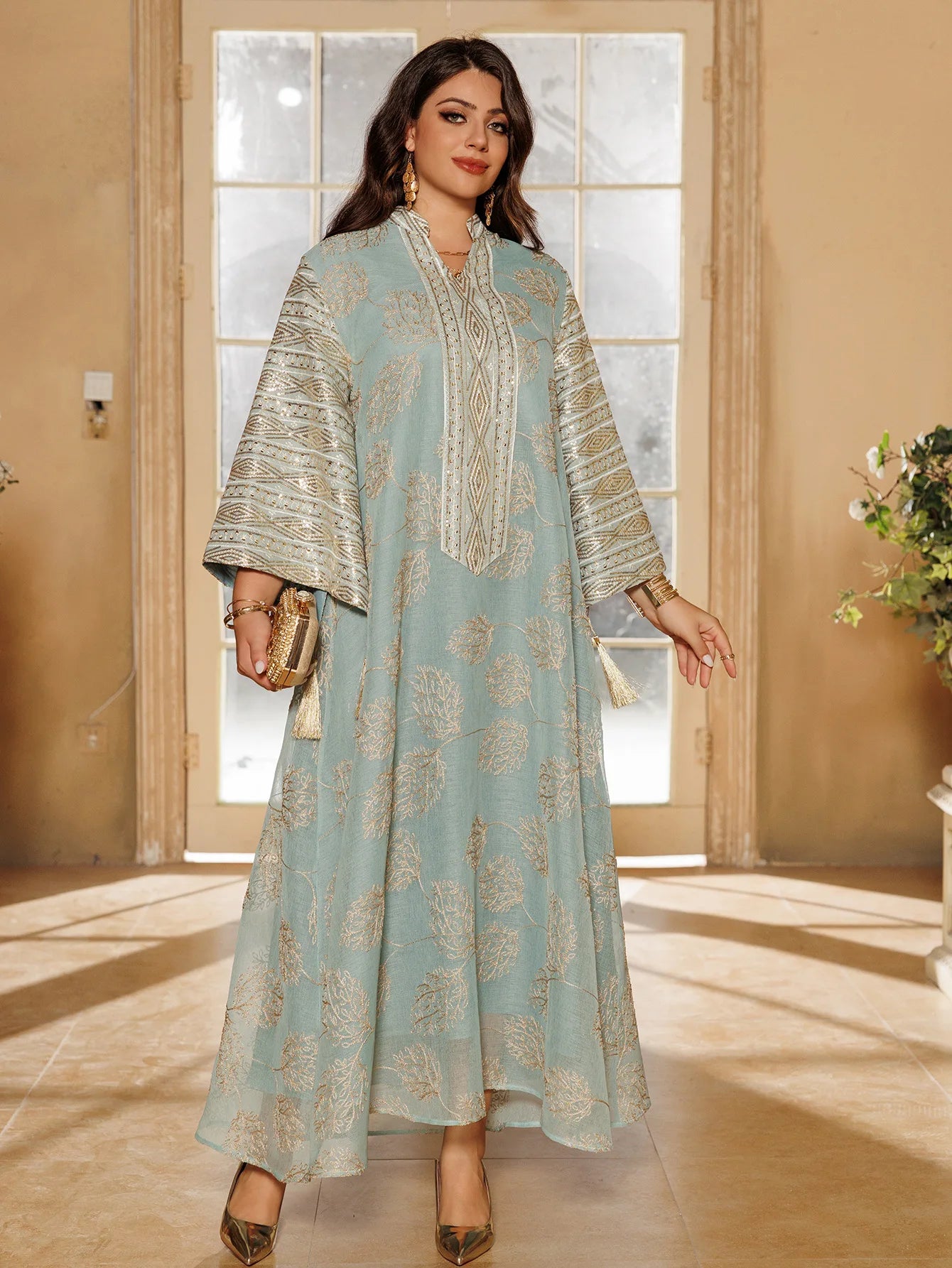 Muslim Women's Light Blue Islamic Embroidered Abaya with Gold Detailing Ideal for Formal Events in Middle East like UAE Saudi