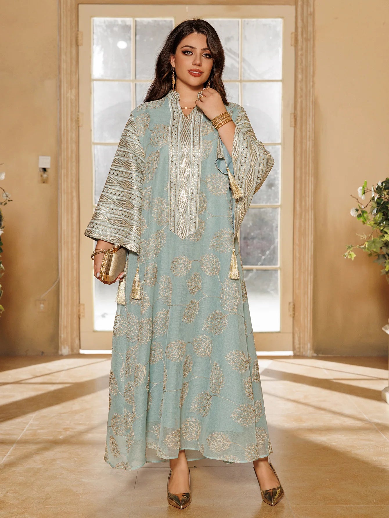 Muslim Women's Light Blue Islamic Embroidered Abaya with Gold Detailing Ideal for Formal Events in Middle East like UAE Saudi